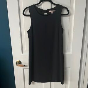 Forever21 small black dress with open back with a black bow